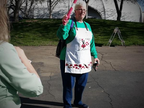The quilt show experience Vendor information while waiting in line