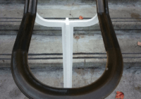 tarnished brass hand rail