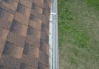 Cleaning out the gutters Clean gutter
