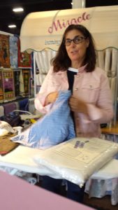 Mid presentation of the Miracle ironing board cover