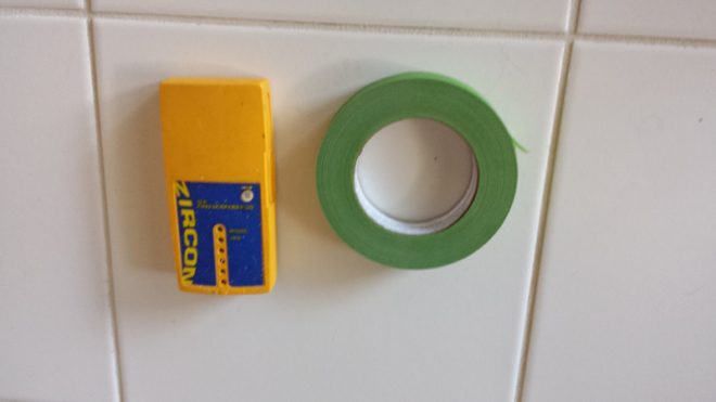 stud finder and masking tape