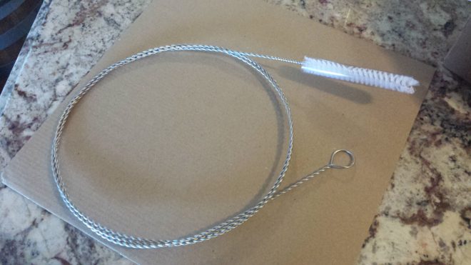 CPAP tube cleaning brush with bristle protector tube