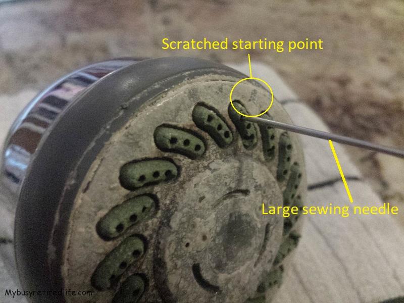 Starting point with large needle in shower head