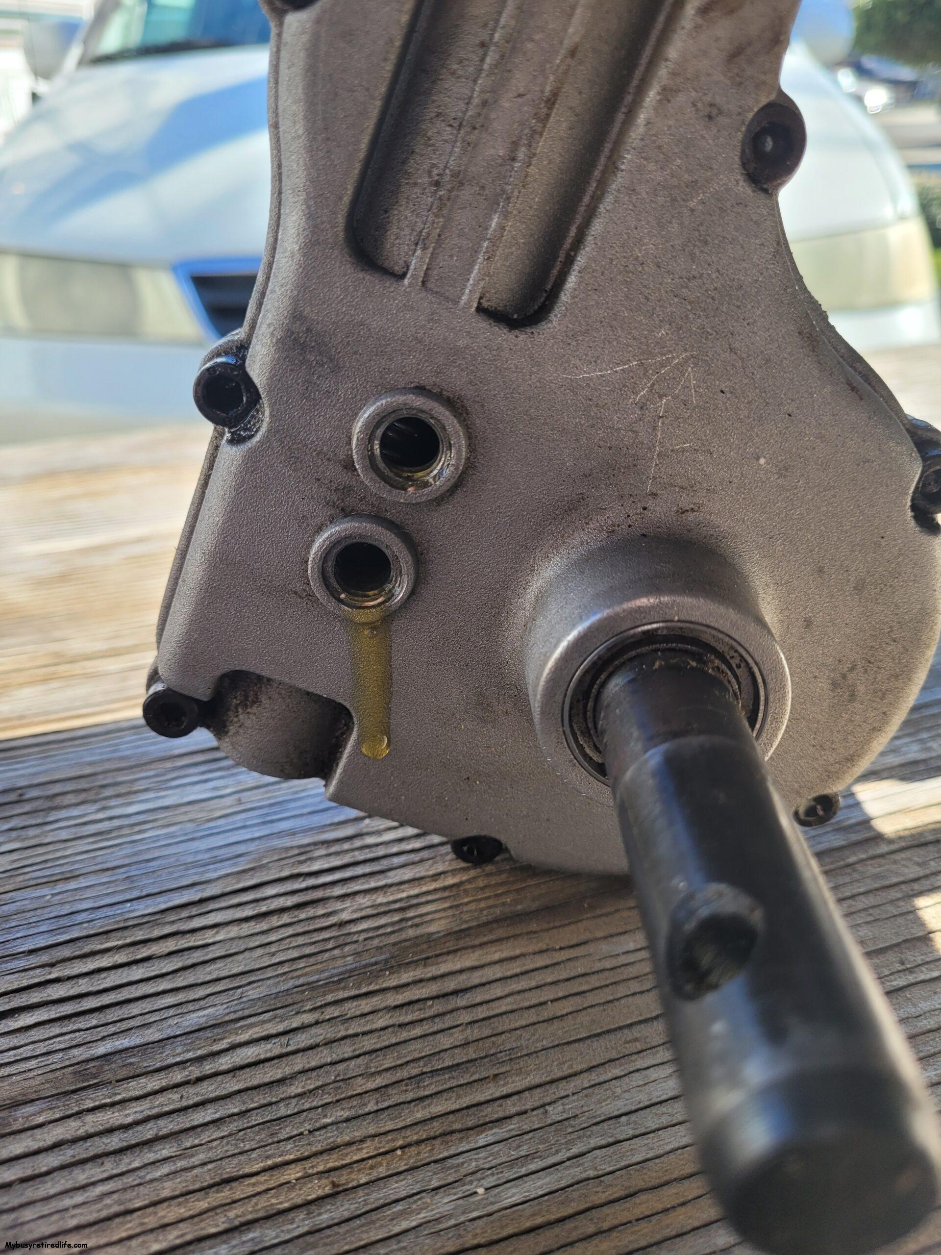 Lowering gear oil to maximum level